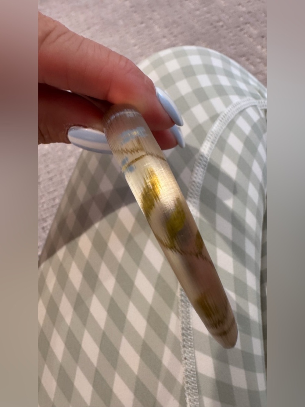 Alexis Bittar Clear Resin Bangle with Gold Leaf Accent and flowers.